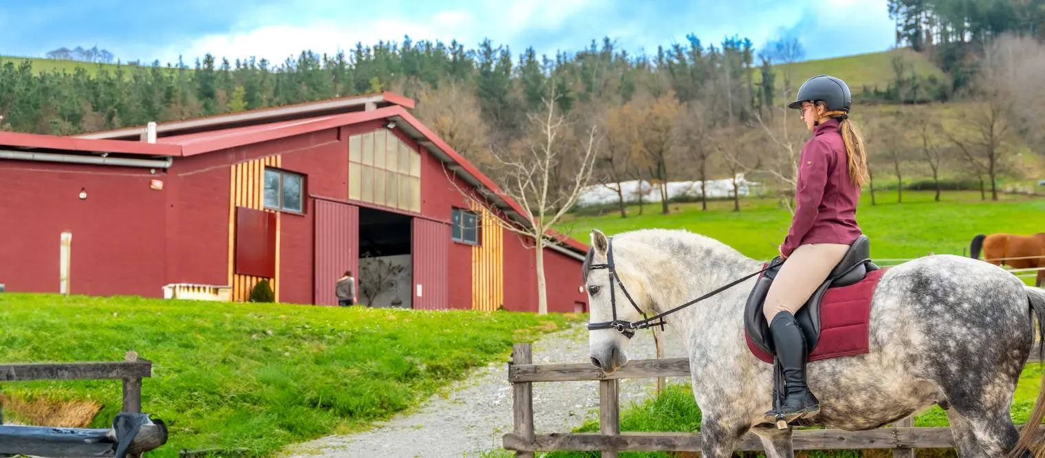 Young female training with her horse 